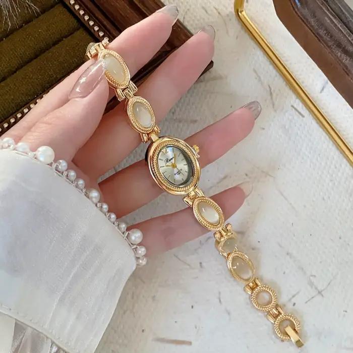 Nouvelle montre-bracelet élégante pour femme avec pierres précieuses colorées, mouvement à quartz, c
