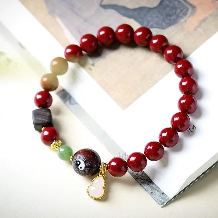 Bracelet ethnique en cinabre avec perles des Neuf Trigrammes Taoïstes et pendentif gourde pour femme