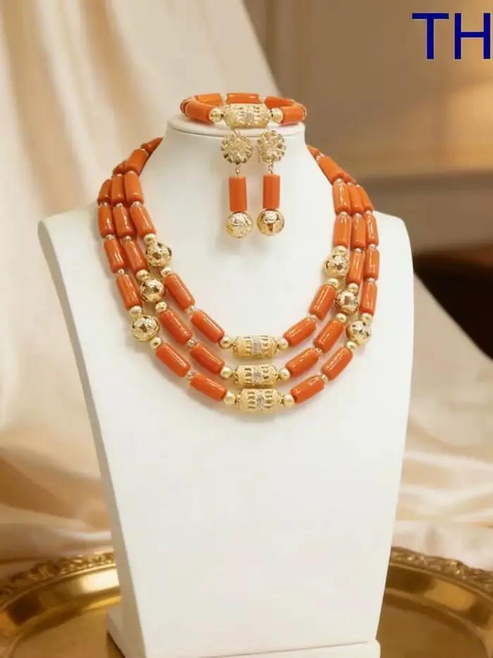 Ensemble de bijoux en grandes perles de corail, mode nigériane