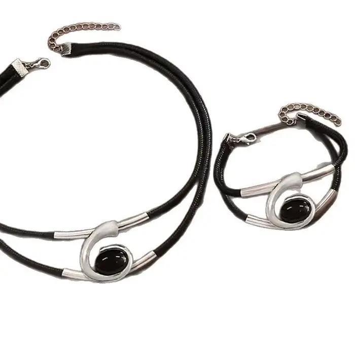 Ensemble de bijoux bohèmes en acrylique noir et zircon pour femmes, collier et bracelets assortis, bijoux tendance