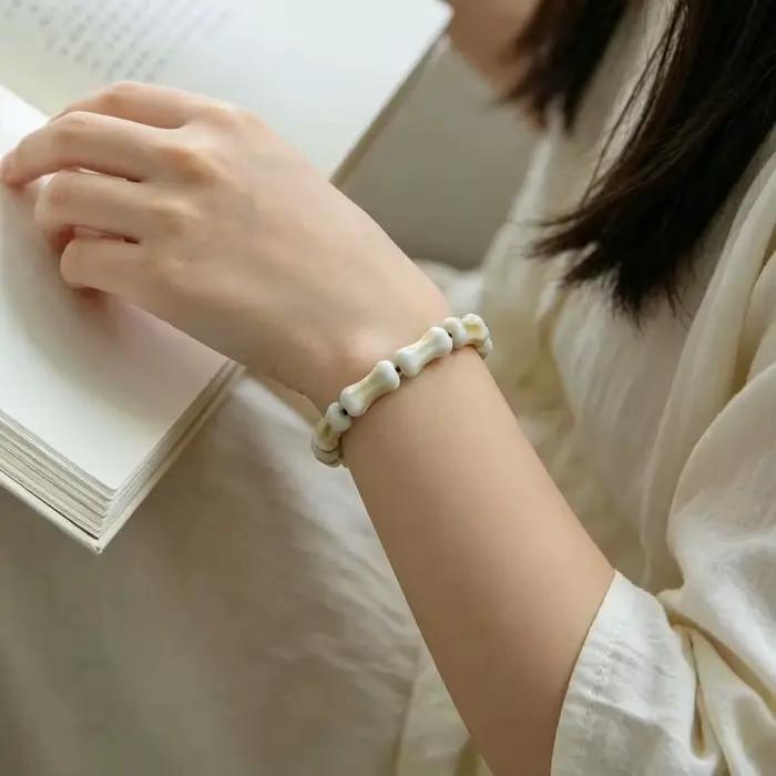 Bracelet en céramique non métallique élégant, petit bijou artisanal en os, bracelet tendance procédé de Jingdezhen, chaîne de main