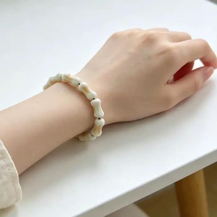 Bracelet en céramique non métallique élégant, petit bijou artisanal en os, bracelet tendance procédé de Jingdezhen, chaîne de main