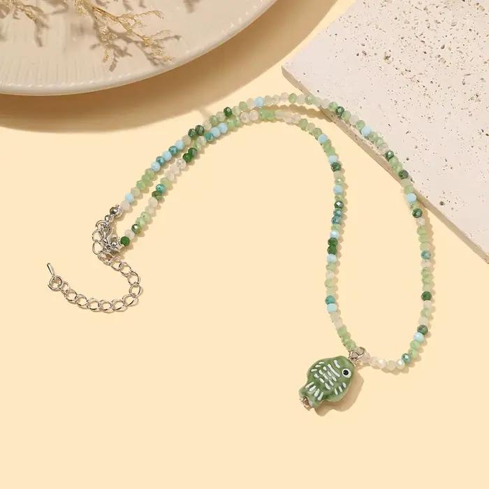 Collier pendentif poisson en céramique style vacances, accessoires vestimentaires pour femmes, bijoux colorés en perles de riz, collier fantaisie pour la plage