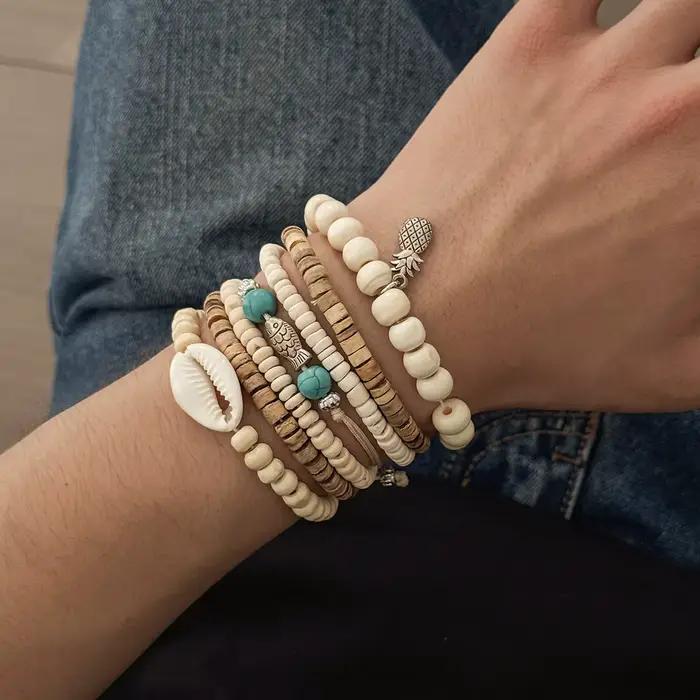 Ingemark Lot de 7 bracelets vintage multicouches en perles de bois pour hommes, avec breloques créatives en forme de petit poisson et d'ananas, bijoux bohèmes
