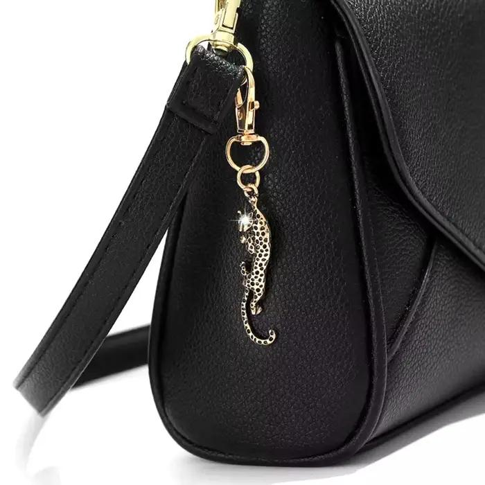 Porte-clés pendentif panthère Animal pour femmes, sac à main, breloques de voiture pour hommes, ornements, bijoux à la mode, cadeaux