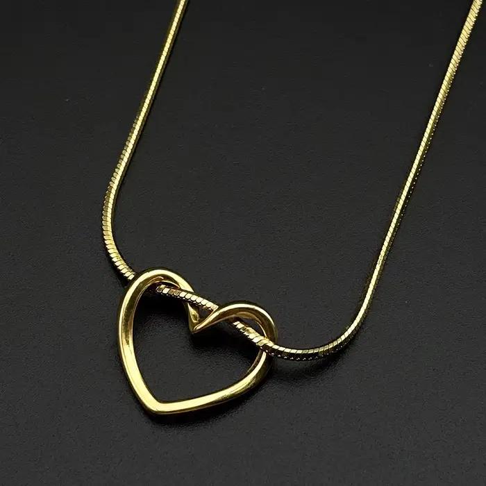 Collier chaîne serpent torsadé en acier inoxydable avec pendentif coulissant en forme de cœur creux pour femme, bijou délicat pour tous les jours