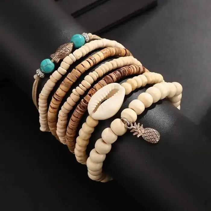 Ingemark Lot de 7 bracelets vintage multicouches en perles de bois pour hommes, avec breloques créatives en forme de petit poisson et d'ananas, bijoux bohèmes