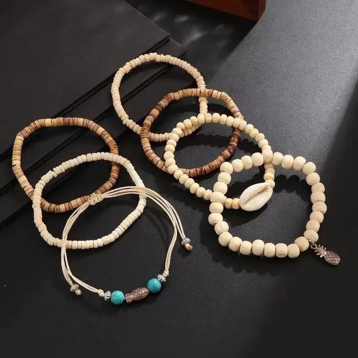 Ingemark Lot de 7 bracelets vintage multicouches en perles de bois pour hommes, avec breloques créatives en forme de petit poisson et d'ananas, bijoux bohèmes