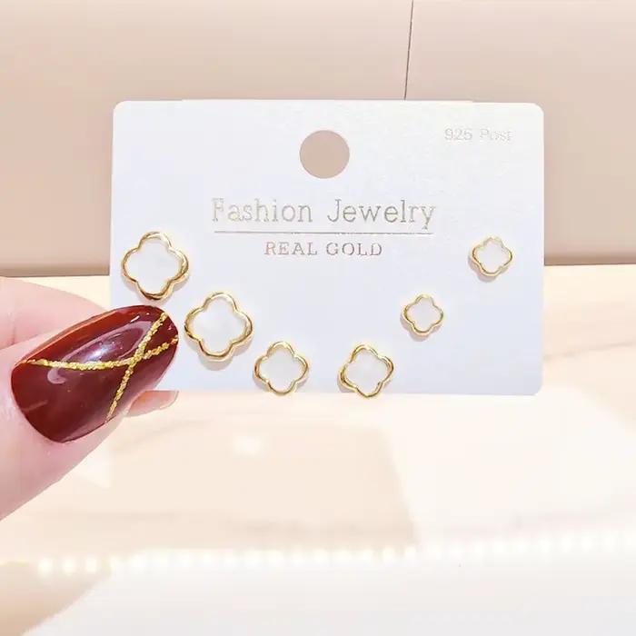 Ensemble de boucles d'oreilles trèfle à quatre feuilles pour femmes, haut de gamme, géométrique intégré, coquille blanche, trois paires de bijoux d'oreille, nouvelle collection 2025