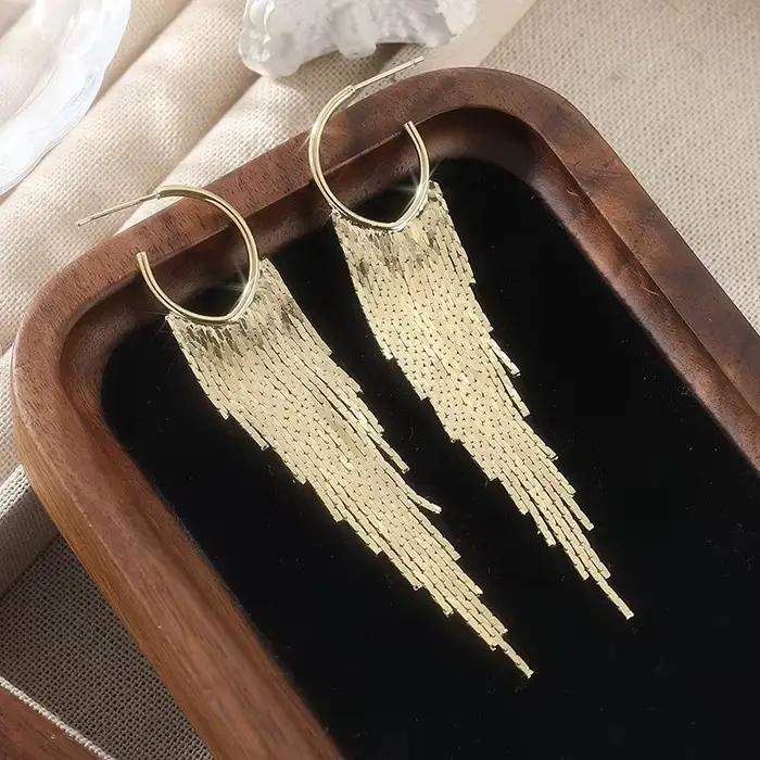 Boucles d'oreilles à pampilles dorées exquises pour femmes, élégantes et brillantes, accessoires de bijoux pour le quotidien, les fêtes et les banquets, artisanat