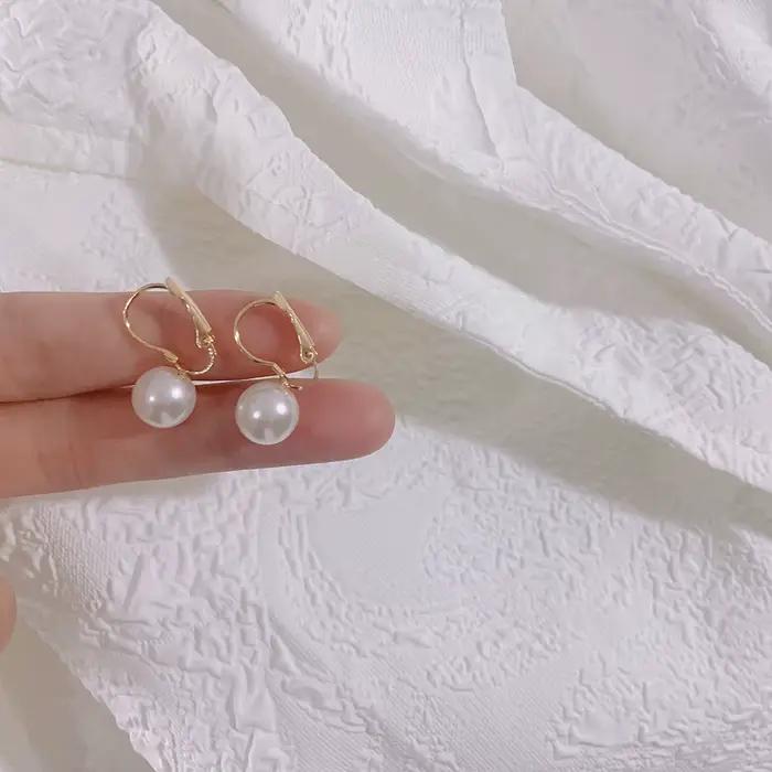 Boucles d'oreilles rondes simples en perles blanches pour femmes, boucles d'oreilles boule, Europe et Amérique, cadeau de bijoux, livraison directe