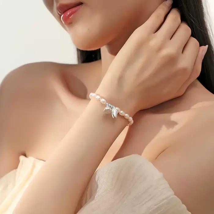 Pendentif polyvalent Bracelet de perles bijoux pour femmes élégant Style français léger luxe Bracelet de perles doux coeur Lotus