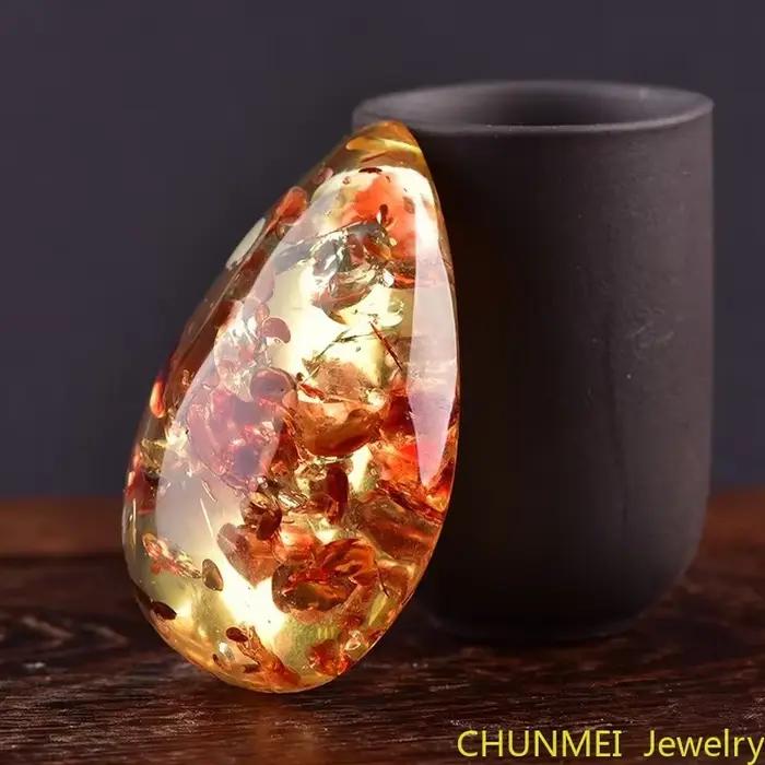 Pendentif goutte de fleur fragmentée pour homme et femme, collier arc-en-ciel original, pierre d'ambre de cire d'abeille, pull