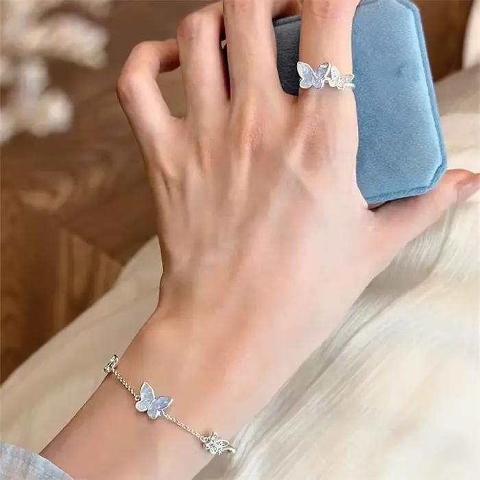 Bracelet papillon luxueux et brillant en zircon pour femmes, collier double papillon en strass bleu, ensemble boucles d'oreilles, bijoux de fête