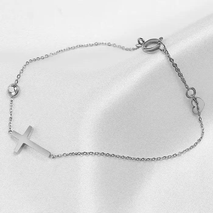 Huitan – Bracelet Simple à chaîne unique pour femmes, breloque croisée fantaisie avec CZ brillant, mode polyvalente, bijoux à main féminins, vente en gros
