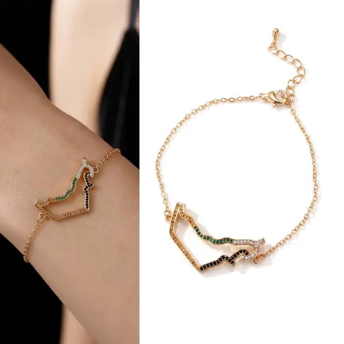Bracelet patriotique avec carte des Émirats arabes unis en cristal, design éblouissant, finition dorée polie avec une carte détaillée des Émirats arabes unis, incrusté.