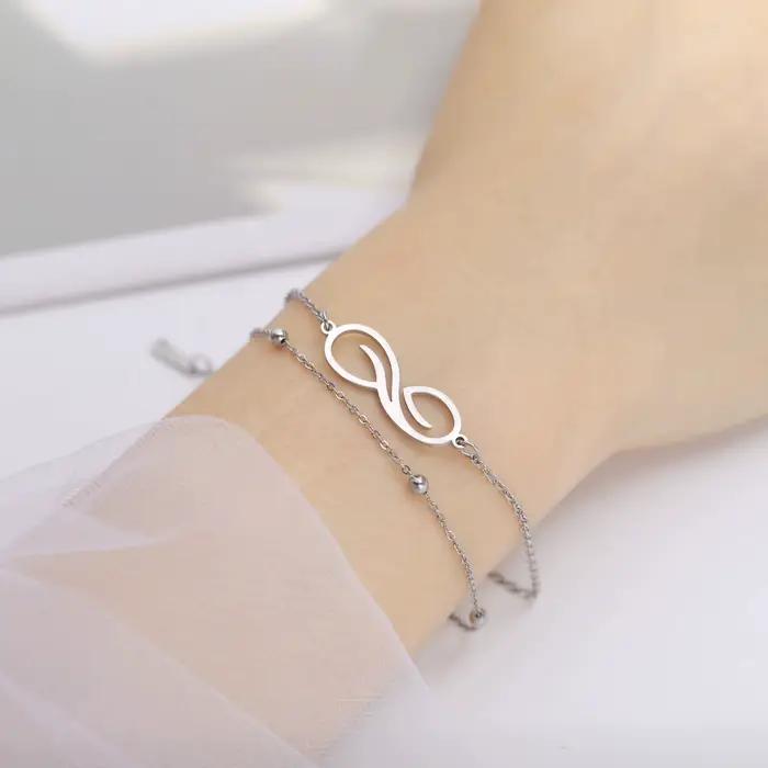 Skyrim – Bracelet symbole infini en acier inoxydable pour femmes, symbole géométrique minimaliste, chaîne de perles Double couche, bijoux cadeau pour Couple