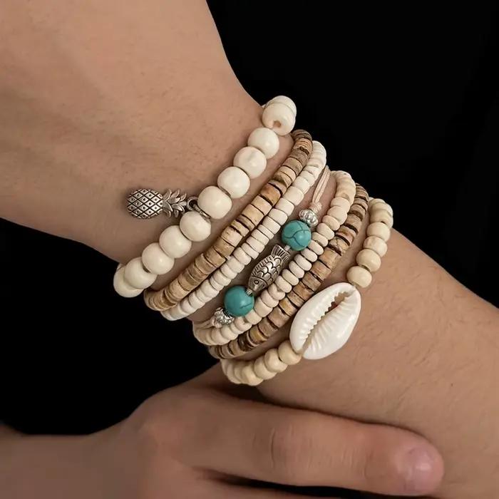 Ingemark Lot de 7 bracelets vintage multicouches en perles de bois pour hommes, avec breloques créatives en forme de petit poisson et d'ananas, bijoux bohèmes