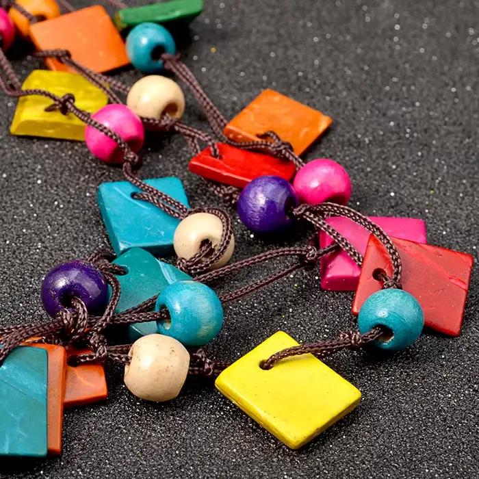 UDDEIN bohême déclaration collier et pendentif multicouche perles bois pendentif Long collier Vintage bavoir bijoux collier fait à la main