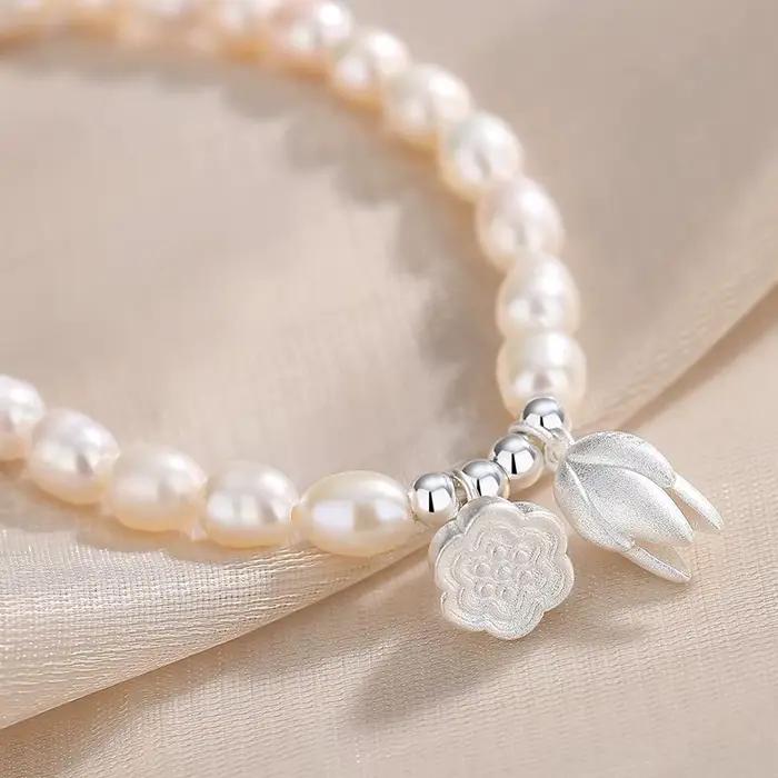 Pendentif polyvalent Bracelet de perles bijoux pour femmes élégant Style français léger luxe Bracelet de perles doux coeur Lotus