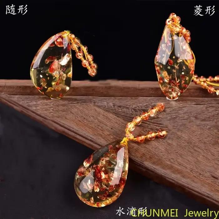 Pendentif goutte de fleur fragmentée pour homme et femme, collier arc-en-ciel original, pierre d'ambre de cire d'abeille, pull