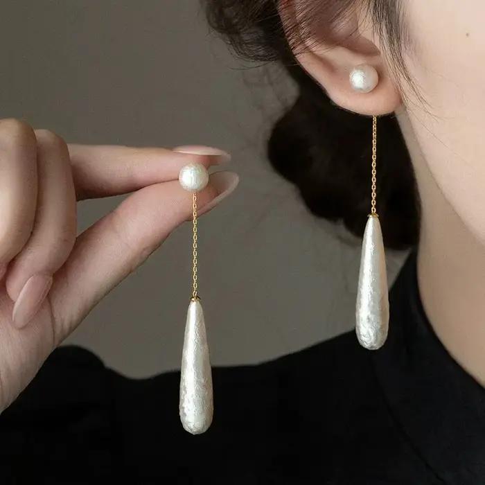 Boucles d'oreilles pendantes imitation perles pour femmes, design de niche élégant, goutte d'eau, bijoux simples, cadeaux pour occasions spéciales
