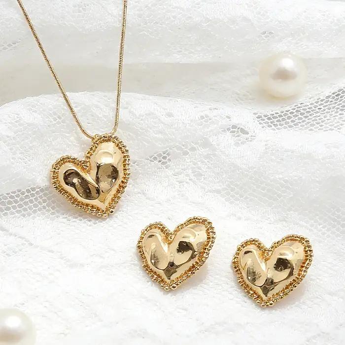 Ensemble de bijoux cœur texturé doré