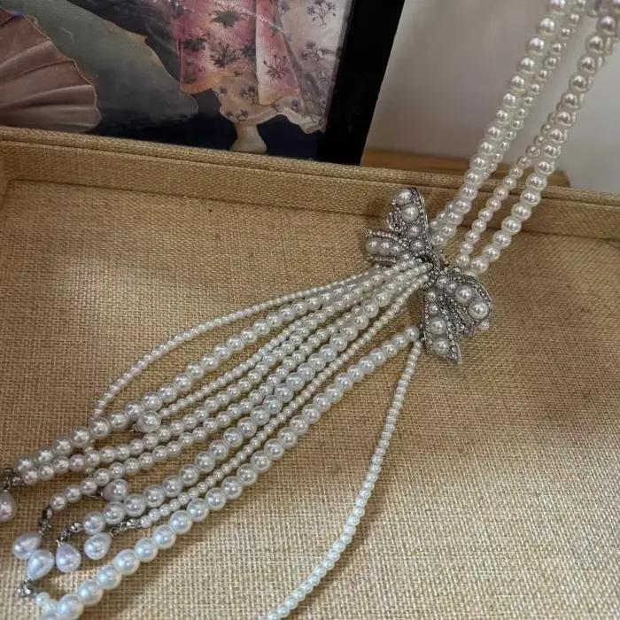 Collier de perles à nœud en diamant français élégant design raffiné chaîne de clavicule pour femmes occasions spéciales