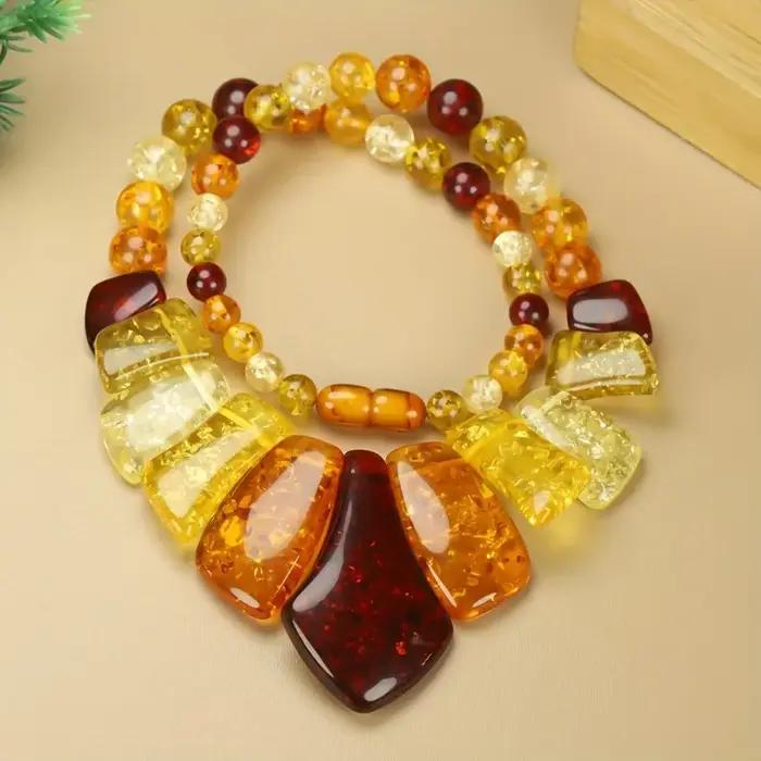 Nouveau collier ambre de cire d'abeille élégant et à la mode