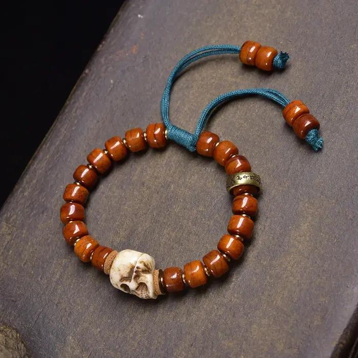 Bracelet tissé à la main avec agate, noix de coco, malachite, multi-gemmes, os de yak et oeil de bou