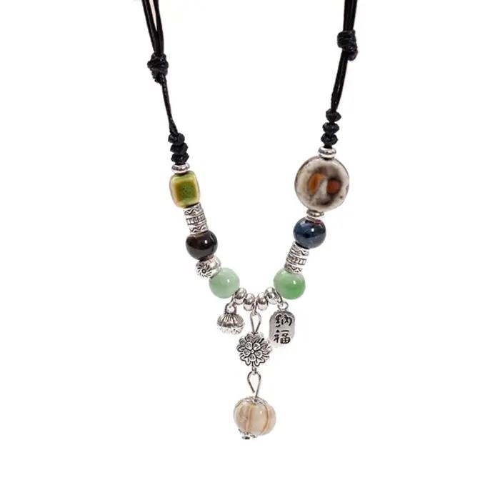 Collier pendentif goutte d'eau en céramique fait à main, ras du cou perles en céramique