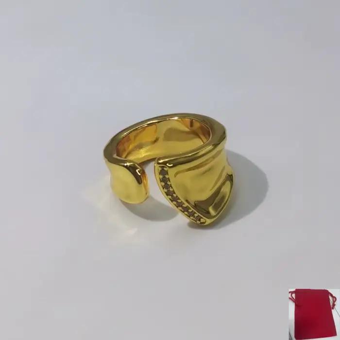 Bague géométrique en or et argent avec diamants