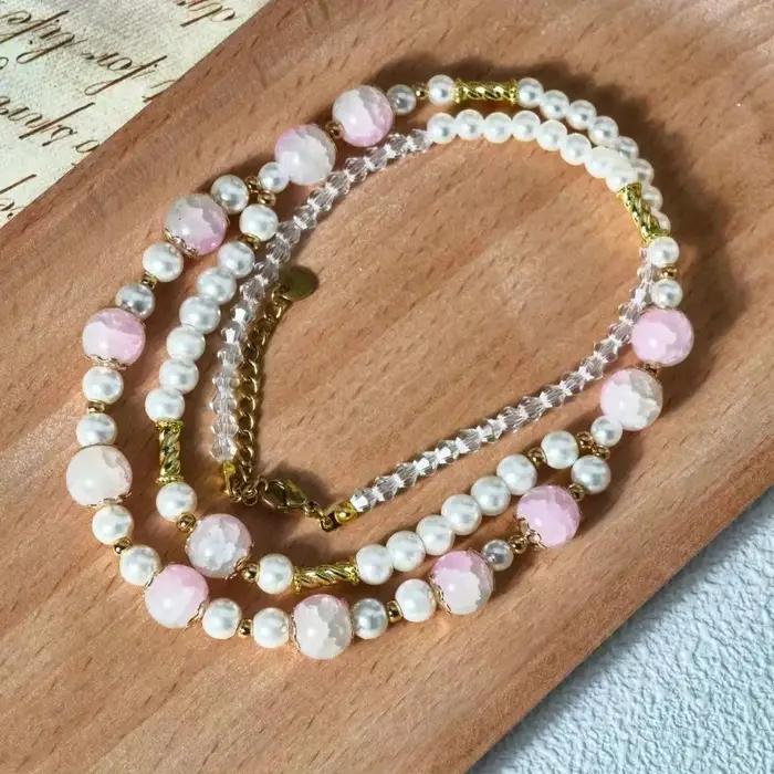 Collier à double rangée avec chaîne de perles en cristal rose