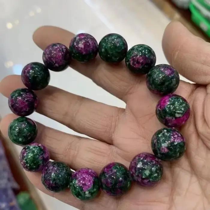 Bracelet de perles rondes en jade de fleur de pêcher colorée