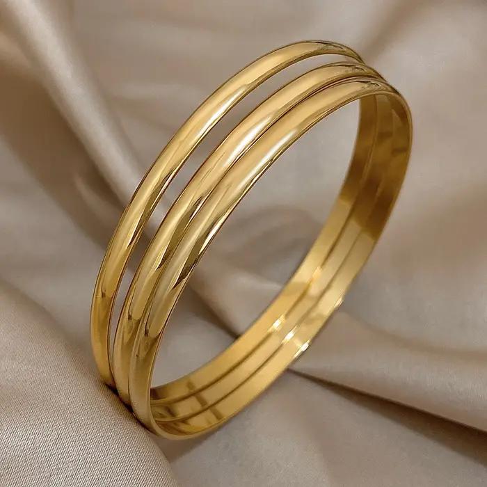 Bracelet en acier inoxydable plaqué or brillant 18 carats pour femmes