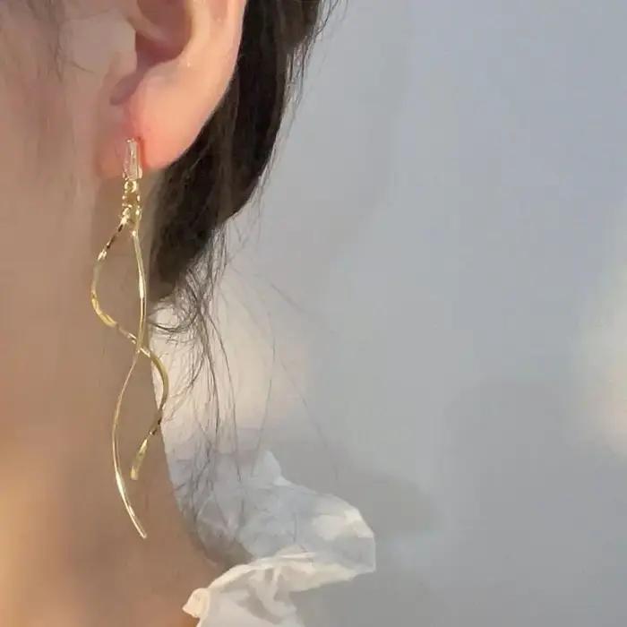 Boucles d'oreilles minimalistes à franges longues et ondulées pour femmes, nouvelles boucles d'oreil