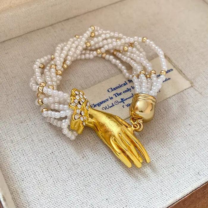Collier de perles multicouches, chaîne de clavicule de tempérament de style palais rétro français