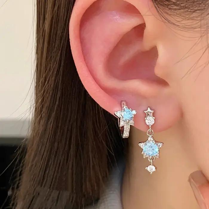 Boucles d'oreilles pendantes en acier chirurgical en forme d'étoile pour femmes