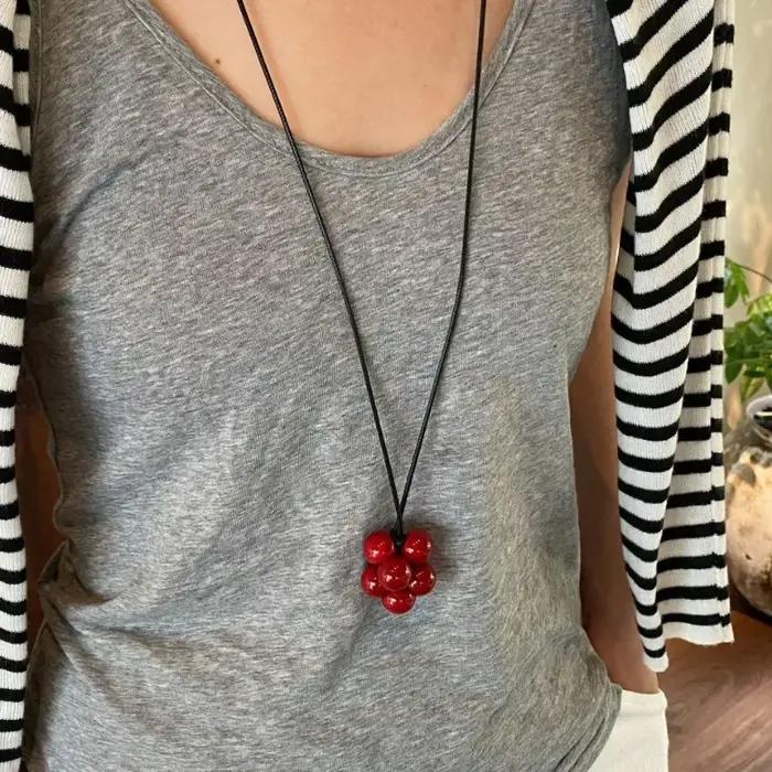 Collier pendentif en perles rondes design azole pour femmes