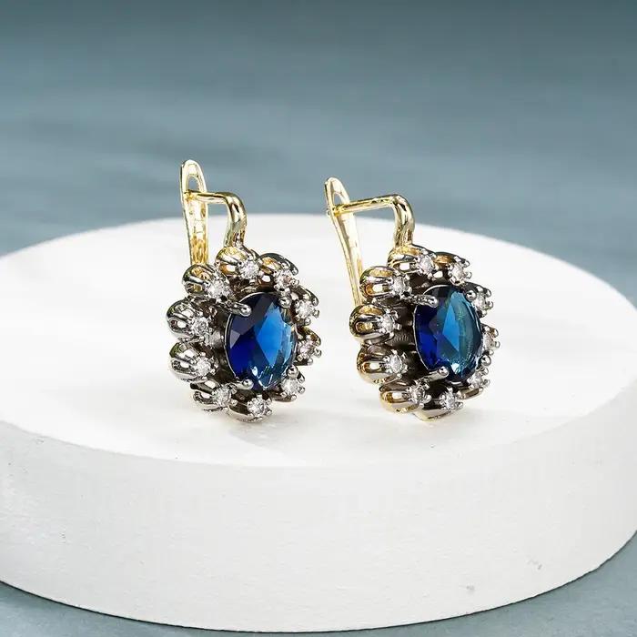 Ensemble de boucles d'oreilles et bague ovales incrustées de zircone