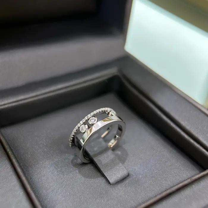 Bague de marque réputée, haute qualité, trois diamants coulissants
