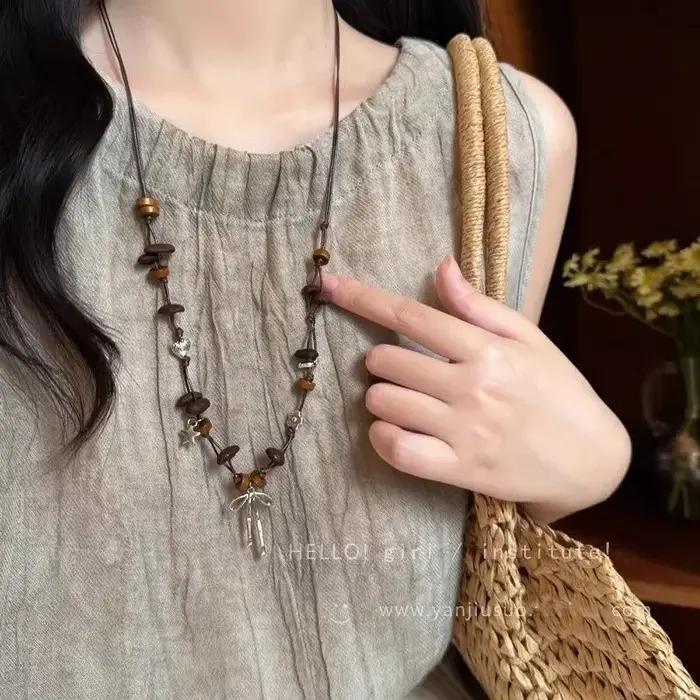 Nouveau collier en perles de café de style chinois pour femmes avec chaîne de pull ajustable et accessoires