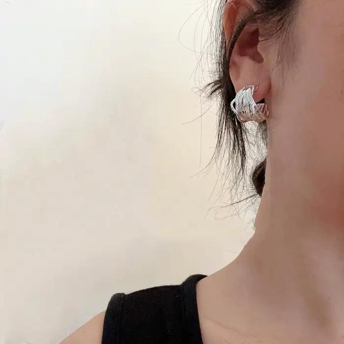 Boucles d'oreilles lignes Interware couleur argent pour femmes