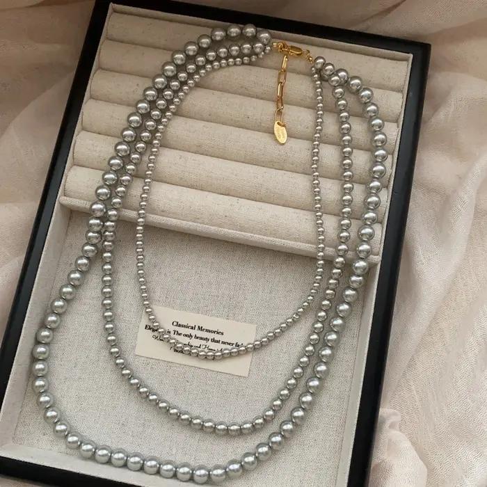Collier long décoratif à perles superposées, chaîne de clavicule haut de gamme de luxe léger, penden
