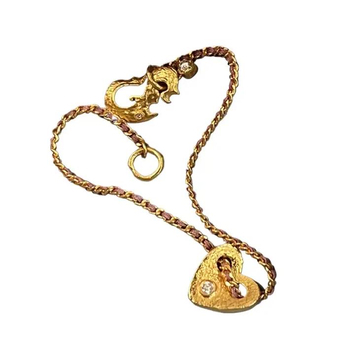 Bracelet en corde tressée en forme de cœur avec zirconium pour femmes occasions d'engagement style classique