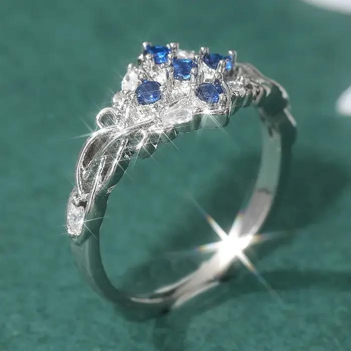 Bague de luxe en zircone synthétique bleue étincelante plaquée argent pour femme, accessoires de bijoux classiques pour banquets et mariages, cadeaux