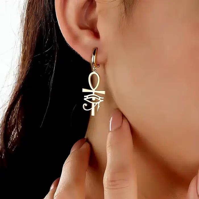 Boucles d'oreilles en forme d'œil d'Horus en alliage de zinc plaqué or KC pour femmes symboles égyptiens occasions spéciales