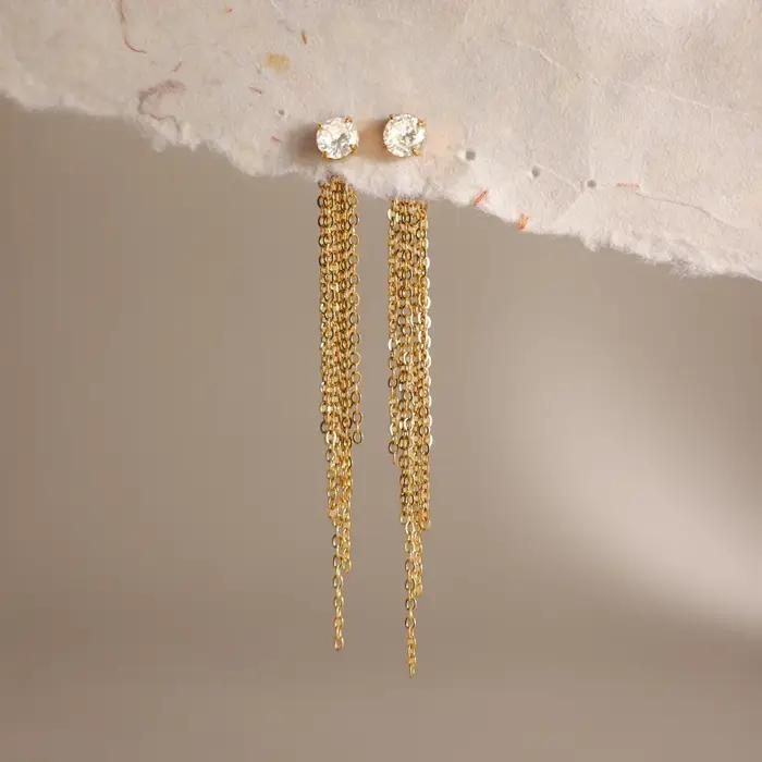 Boucles d'oreilles pendantes Zora en acier inoxydable plaqué or 18 carats PVD avec zircon et pompon