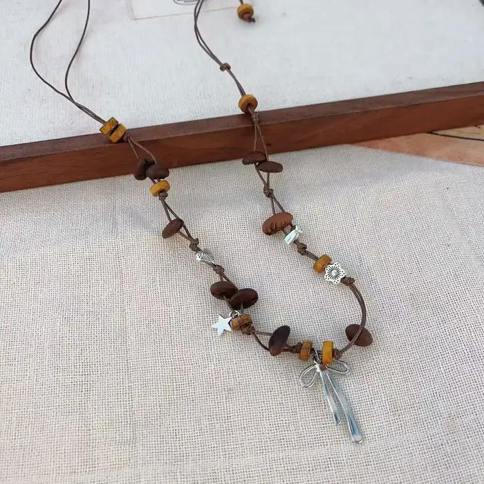 Nouveau collier en perles de café de style chinois pour femmes avec chaîne de pull ajustable et accessoires