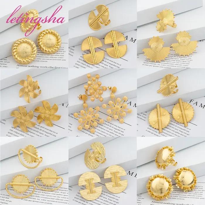 Ensemble de boucles d'oreilles et de matiques en or africain pour femmes